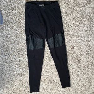 Black leggings with leather patch details